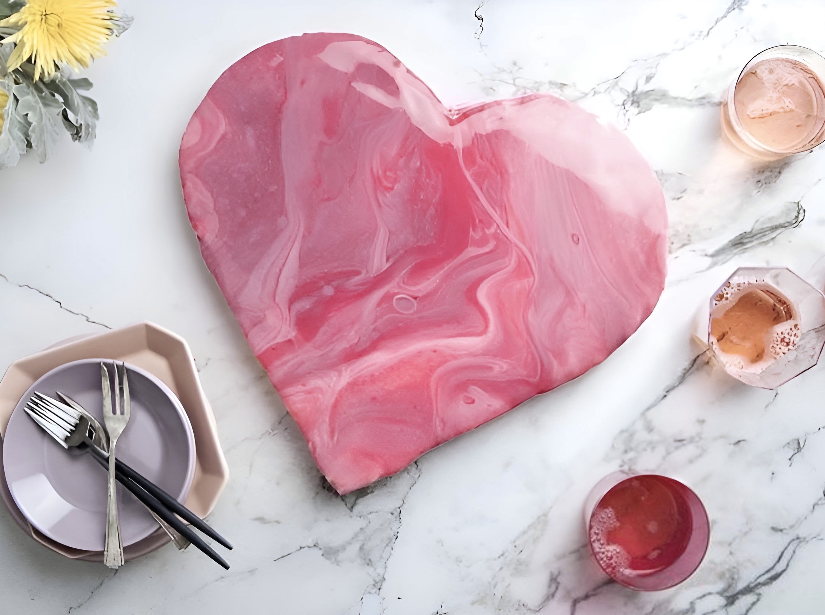 Heart shaped cake with pink marble glaze